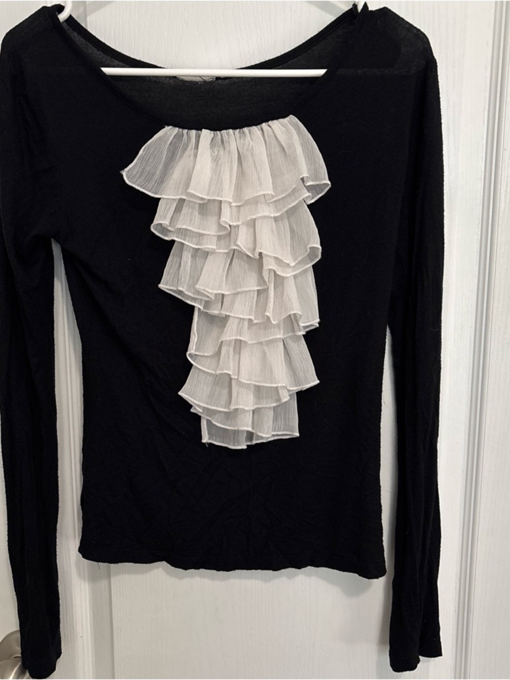 Black Long-Sleeve Ruffle Front Top with White Accents